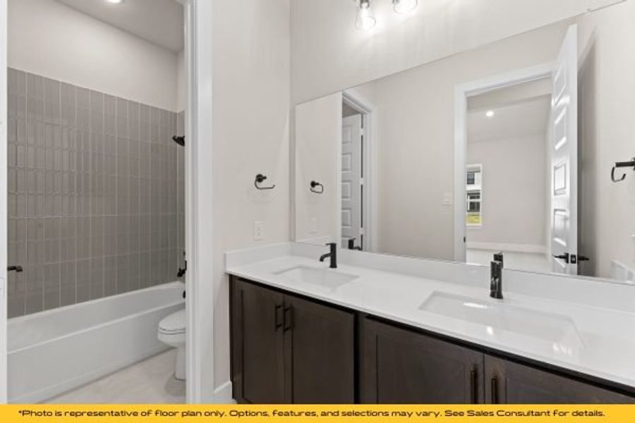 Representative furnished interior of a home built from the Belize by Stonefield Homes in Heath Golf and Yacht Club, Rockwall (Image 53).