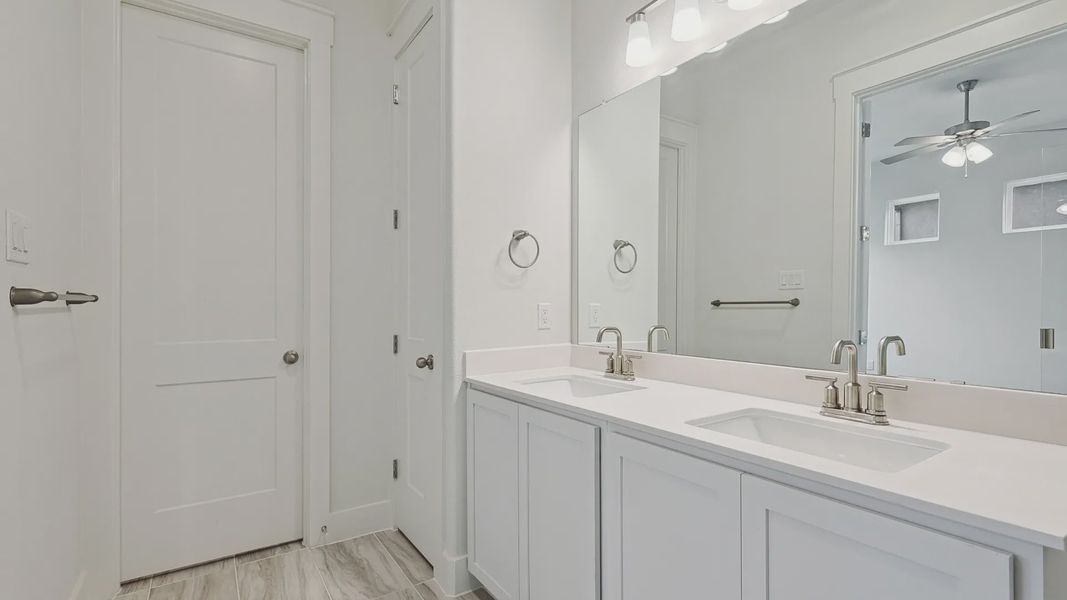 Furnished interior view inside a new home in Collin Creek, Plano (Image 21).