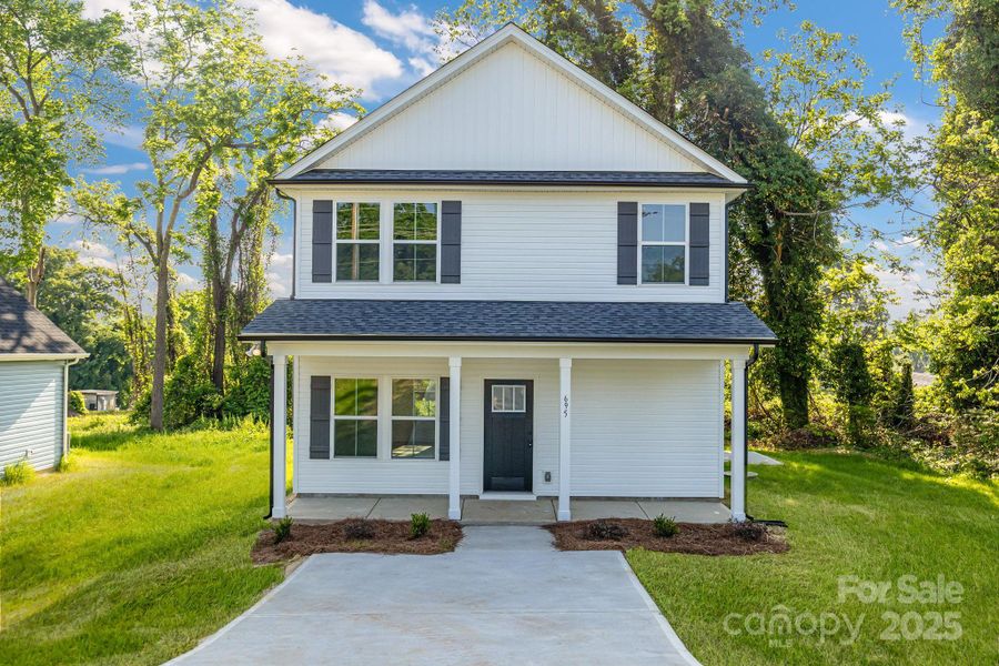 Front exterior of a new home in , Statesville, NC, highlighting curb appeal (Image 17).