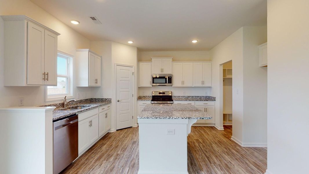 Furnished interior in a model home at Heritage Pointe in Newport (Image 6).