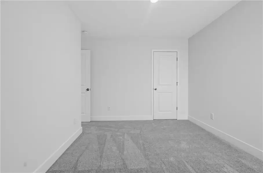 Spacious, unfurnished interior of a new home in Towns at Holly Springs, Holly Springs (Image 25). Spacious, unfurnished interior of a new home in Towns at Holly Springs, Holly Springs (Image 25).