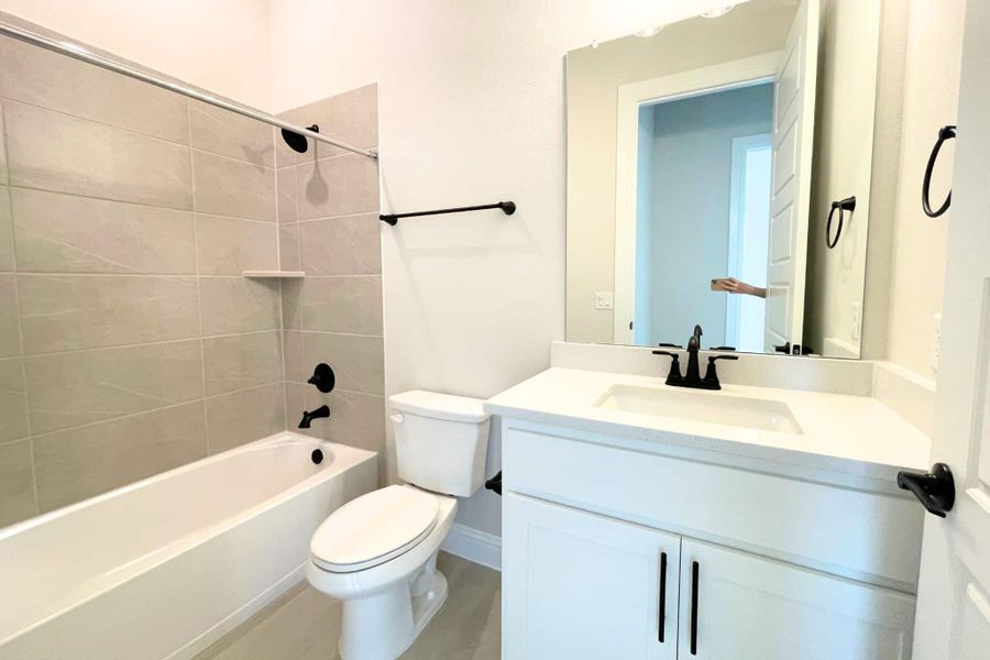 Furnished interior view inside a new home in Whisper Valley, Manor (Image 18).