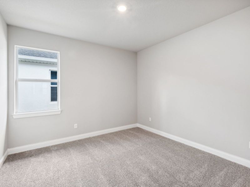 Bedroom in the Jade floorplan at 6358 Sweetwood Drive