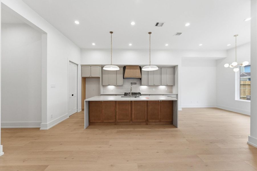 Another view of the kitchen and dining room.