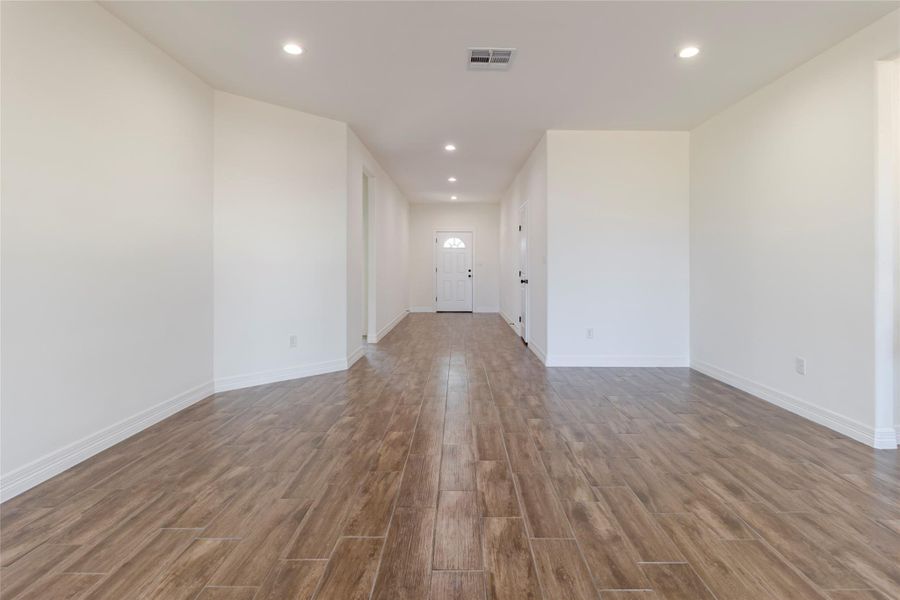 Wide-plank, wood-look tile runs throughout the entire home, no carpet and no mixture of flooring from room to room. Wide-plank, wood-look tile runs throughout the entire home, no carpet and no mixture of flooring from room to room.