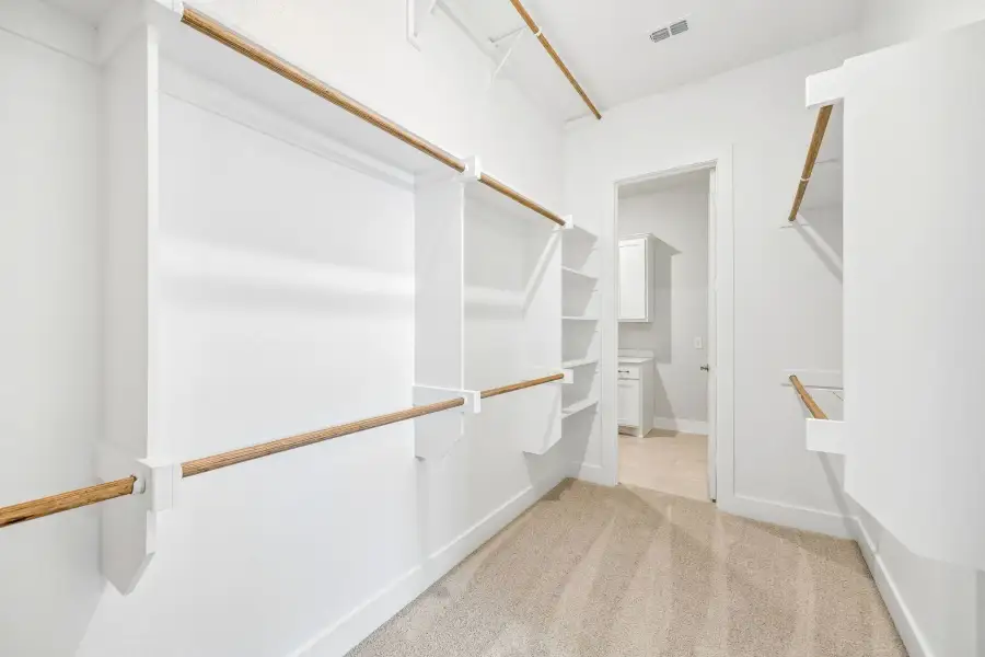 Spacious, unfurnished interior of a new home in Rainwater Crossing, Celina (Image 24).