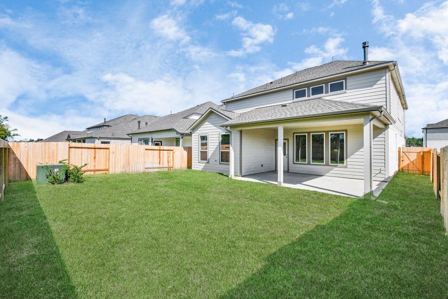 Come and see this spacious backyard with its beautiful covered patio. There is plenty of room for the kids to play and adults to relax. Perfect for your outdoor living space, patio furniture, bbq pit, and so much more. The possibilities are endless! Come and see this spacious backyard with its beautiful covered patio. There is plenty of room for the kids to play and adults to relax. Perfect for your outdoor living space, patio furniture, bbq pit, and so much more. The possibilities are endless!