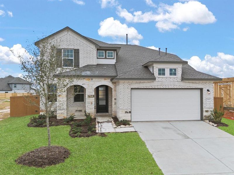 Welcome home to 27615 Beachside Arbor Drive located in the master planned community of Sunterra and zoned to Katy ISD.