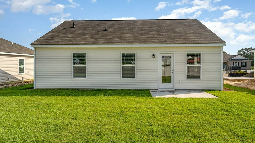 Representative exterior photo of a completed home built from the CURTIS by D.R. Horton in The Cottages at Blake Farm, Wilmington, NC (Image 4). Representative exterior photo of a completed home built from the CURTIS by D.R. Horton in The Cottages at Blake Farm, Wilmington, NC (Image 4).