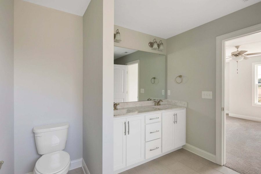 Representative furnished interior of a home built from the Drayton by Caviness & Cates Communities in Bartlett Manor, Youngsville (Image 232).
