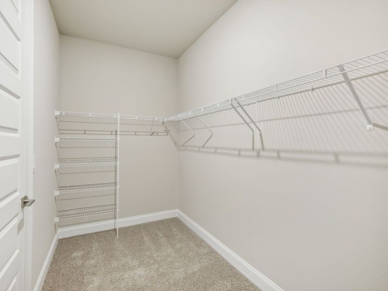 Primary Closet in the Coral floorplan at 6398 NW Sweetwood Dr