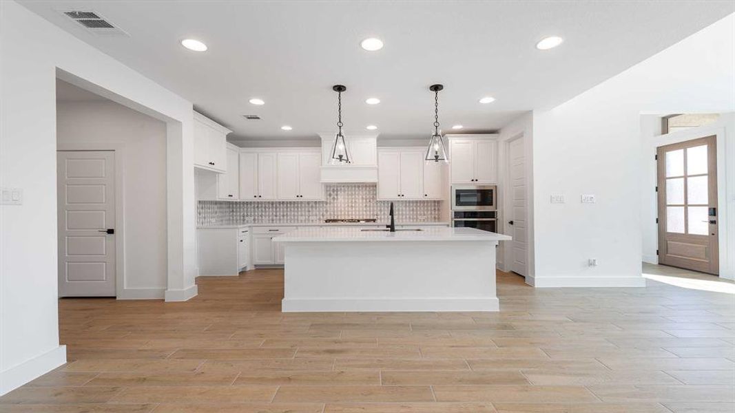 Furnished interior view inside a new home in The Heights At Uptown Celina 45', Celina (Image 8). Furnished interior view inside a new home in The Heights At Uptown Celina 45', Celina (Image 8).