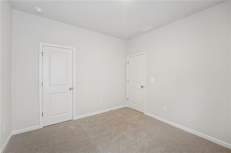 Spacious, unfurnished interior of a new home in Westmont Preserve, Powder Springs (Image 28).