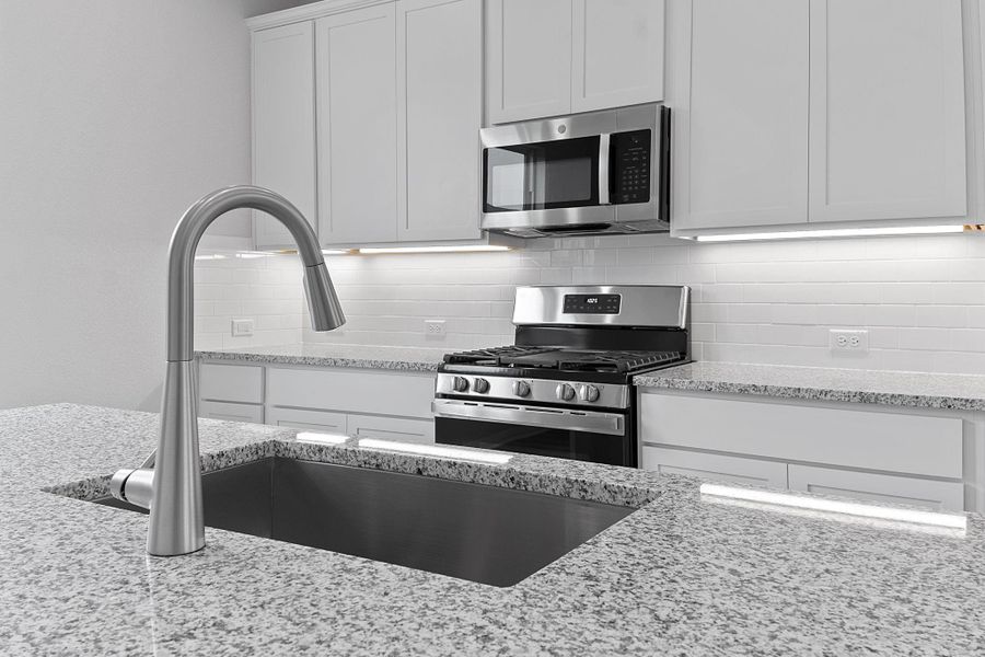 Furnished interior view inside a new home in Retreat at Hero Way, Leander (Image 6).