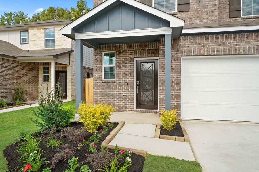 Exterior details and patio area of a home in Lakes at Black Oak, Magnolia (Image 3).