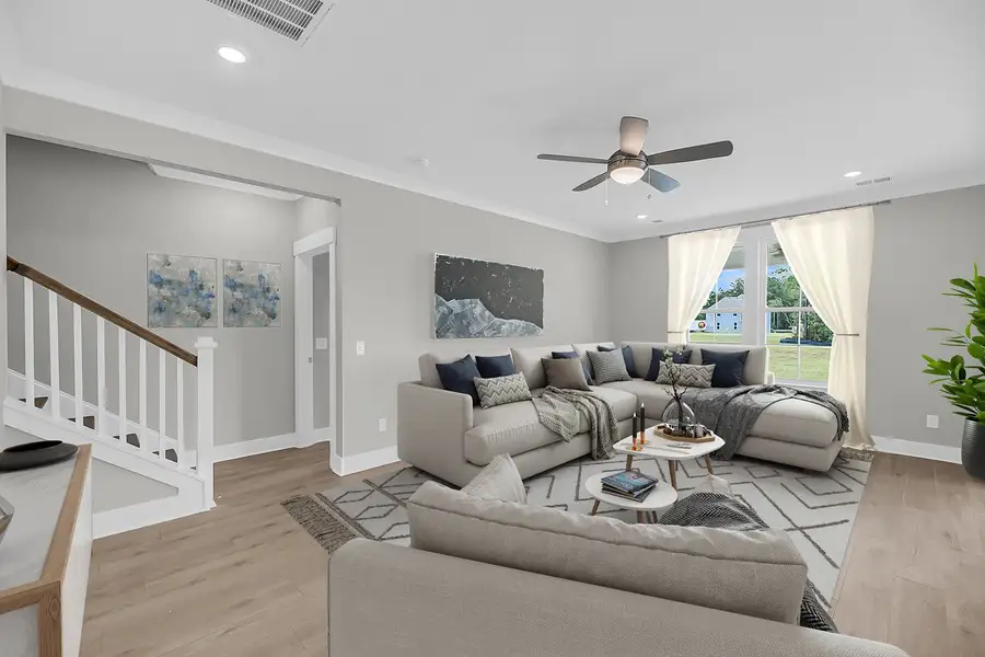 Representative furnished interior of a home built from the Bates II - Vanguard Collection by Mungo Homes in Grand Park, Leland (Image 4).
