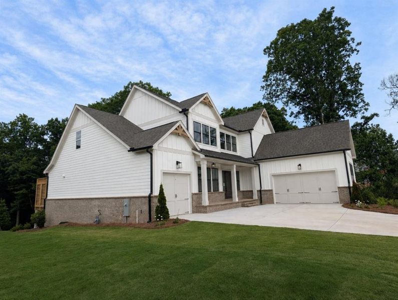 Front exterior of a new home in White Post on Lake Lanier, Gainesville, GA, highlighting curb appeal (Image 20).