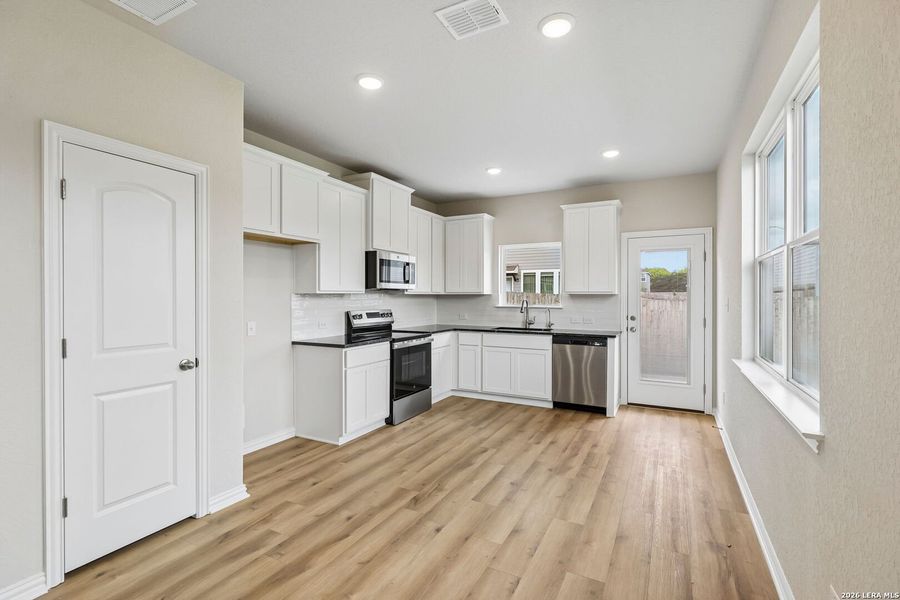 Furnished interior view inside a new home in Casinas at Gruene, New Braunfels (Image 8).