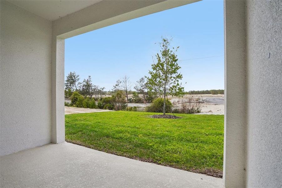 Exterior details and patio area of a home in Trinity Gardens, Deland (Image 17).