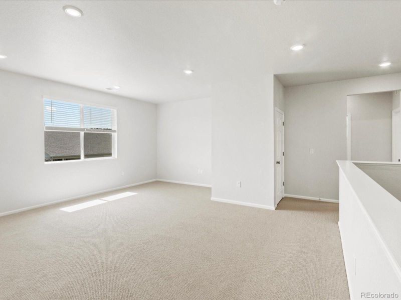 Spacious, unfurnished interior of a new home in Poudre Heights: The Alpine Collection, Windsor (Image 24).