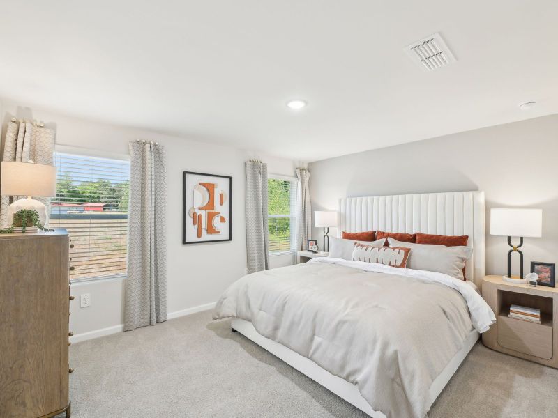 Primary bedroom in the Topaz floorplan at a Meritage Homes community in Mebane, NC.