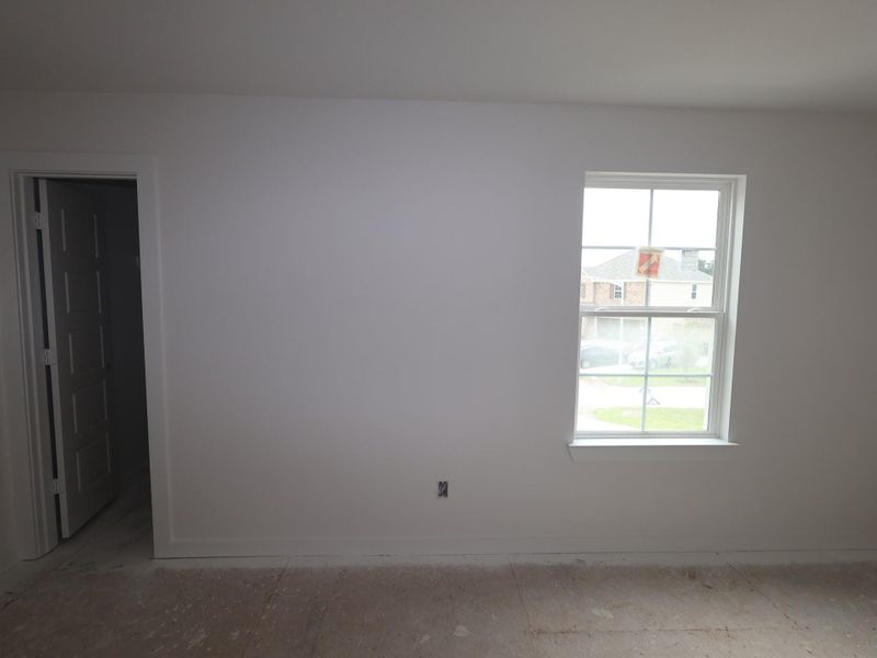 Spacious, unfurnished interior of a new home in Pinewood at Grand Texas, New Caney (Image 10).