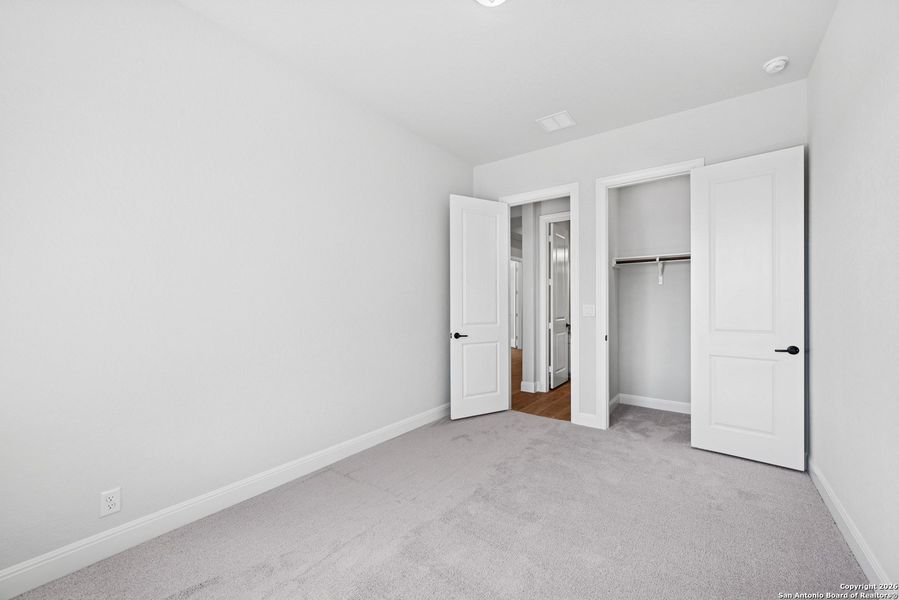 Spacious, unfurnished interior of a new home in Windsong - Legacy Series, Boerne (Image 19).