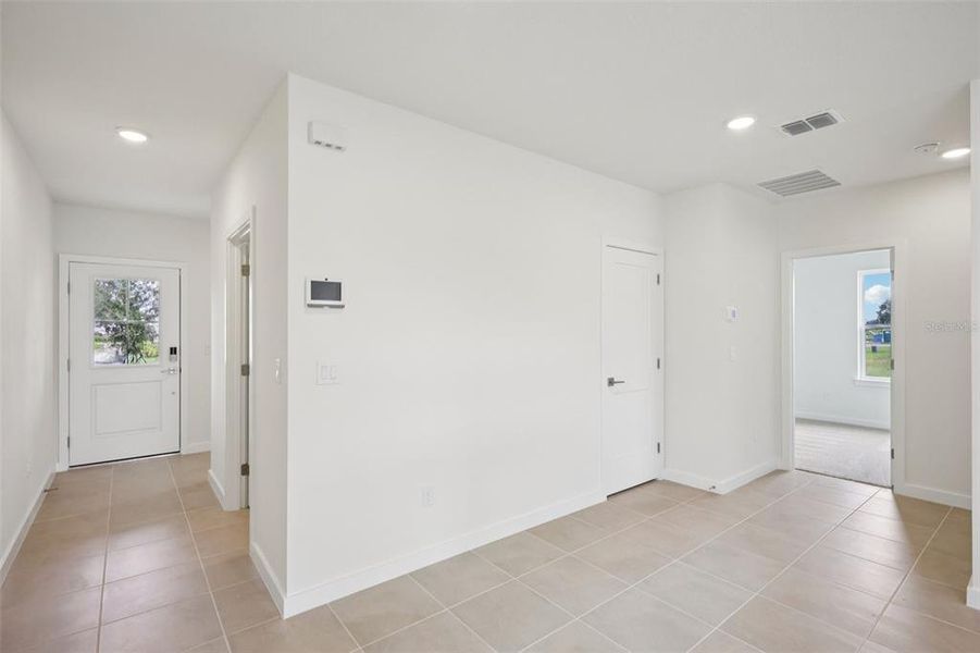 Spacious, unfurnished interior of a new home in Grasslands West, Lakeland (Image 23).