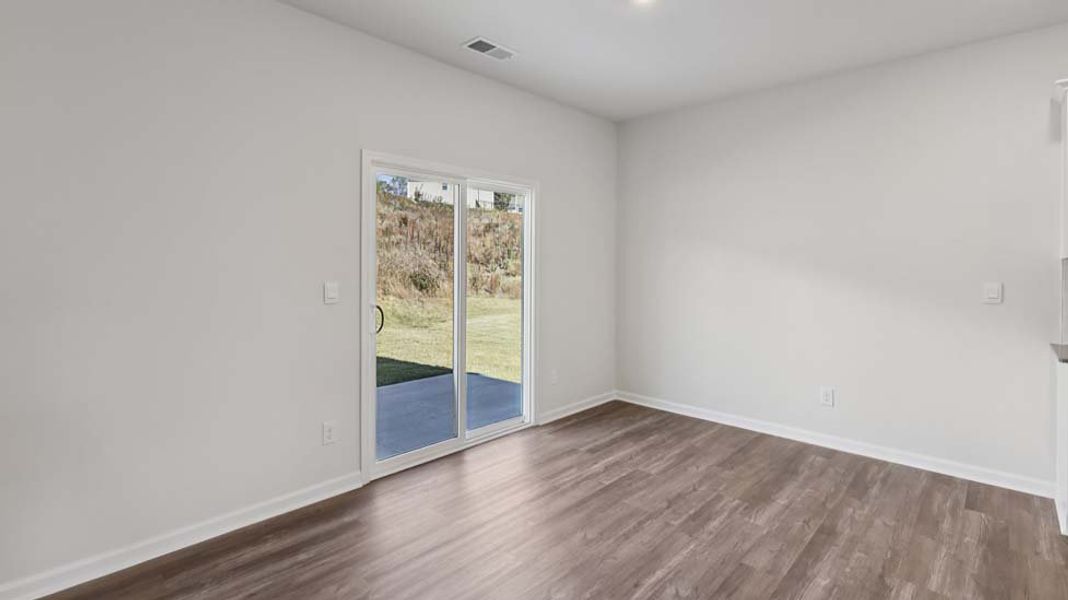Spacious, unfurnished interior of a new home in Rydele Heights, Asheville (Image 25).