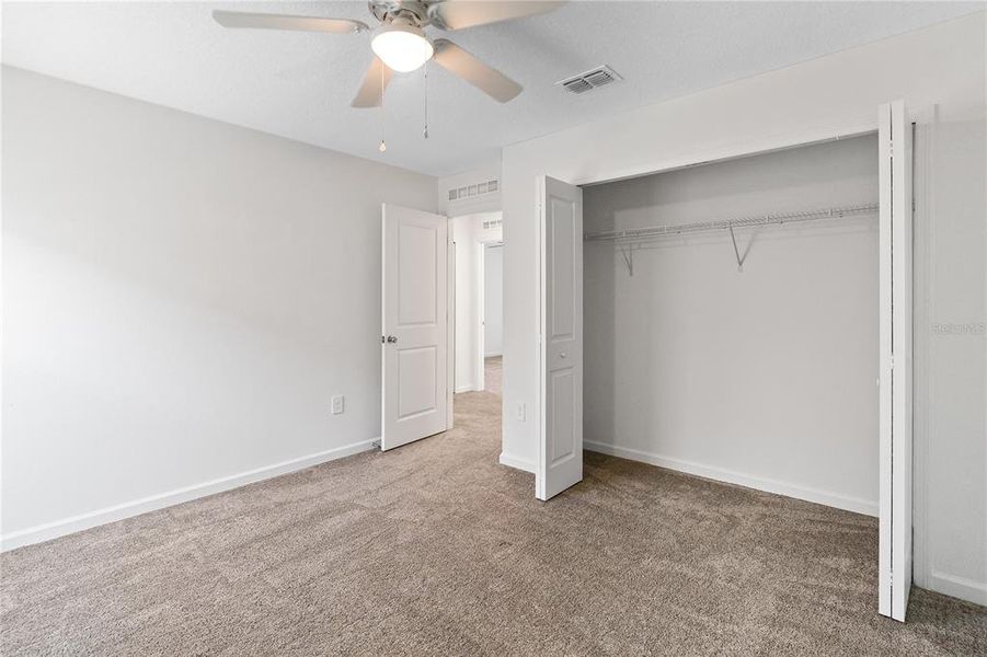 Spacious, unfurnished interior of a new home in Storey Creek: Manor Collection, Kissimmee (Image 20).