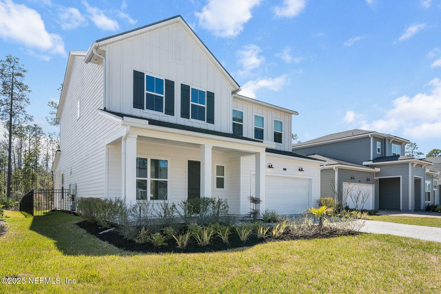Front exterior of a new home in , Jacksonville, FL, highlighting curb appeal (Image 21).