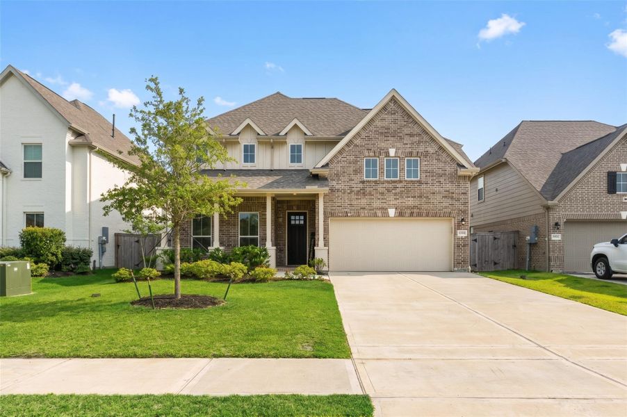 Front exterior of a new home in The Commons at Sedona, League City, TX, highlighting curb appeal (Image 1). Front exterior of a new home in The Commons at Sedona, League City, TX, highlighting curb appeal (Image 1).