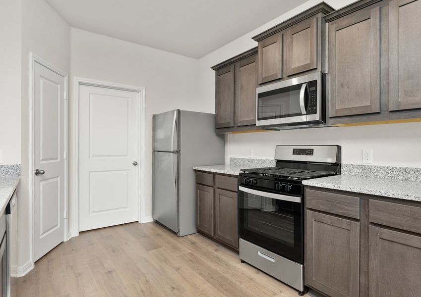The kitchen of the Cypress has energy-efficient appliances. The kitchen of the Cypress has energy-efficient appliances.