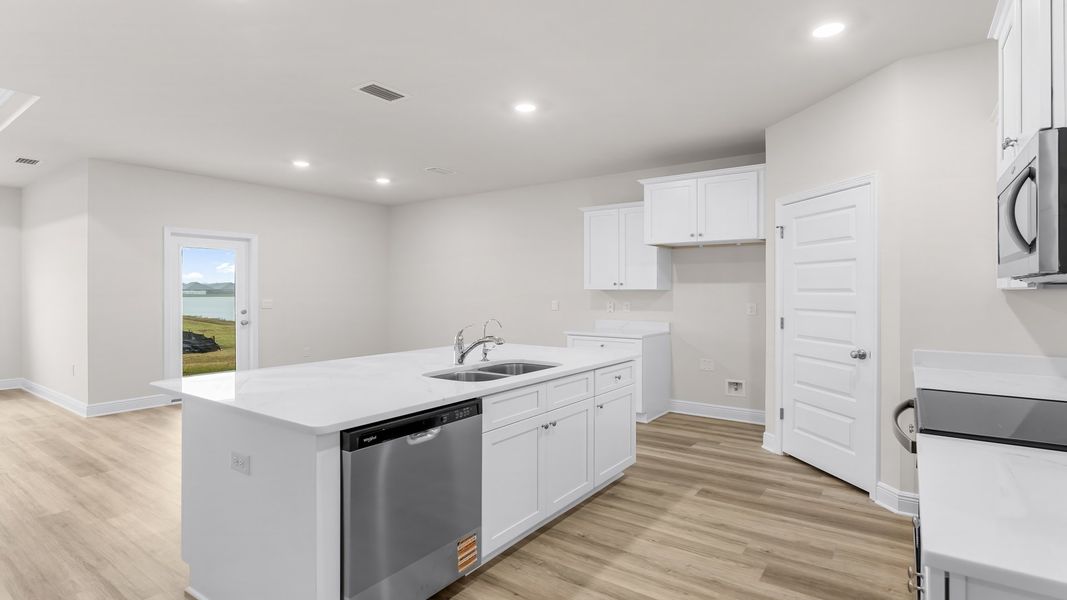 Representative furnished interior of a home built from the The Rhett by D.R. Horton in Hodges Bayou Plantation, Panama City (Image 8).