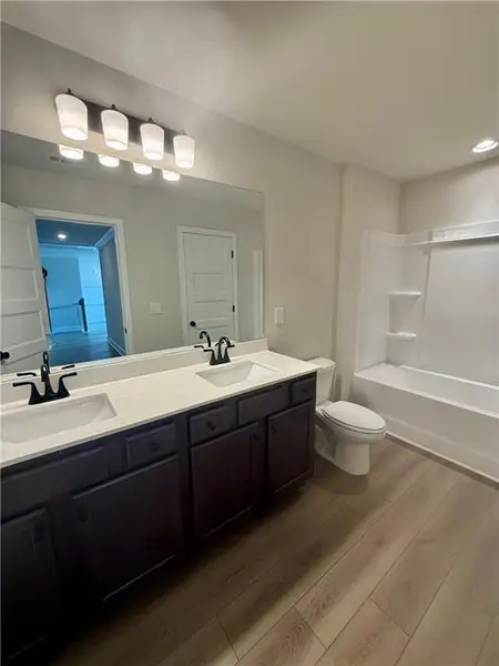 Furnished interior view inside a new home in Fowler Farms, Auburn (Image 8).