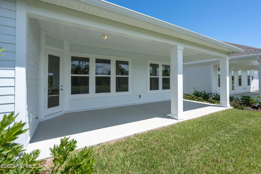 Exterior details and patio area of a home in Madeira, St. Augustine (Image 21).