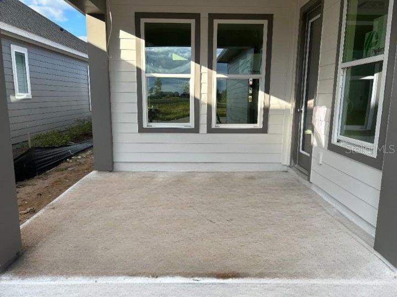 Exterior details and patio area of a home in Weslyn Park Single Family, St. Cloud (Image 2).