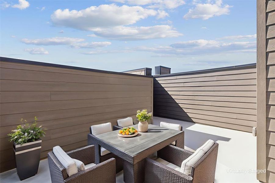 Roof top patio with outdoor dining space Roof top patio with outdoor dining space