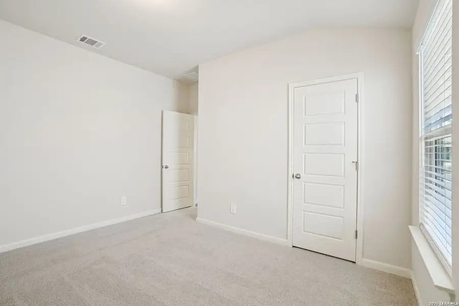Spacious, unfurnished interior of a new home in Estancia Ranch - Classic Series, San Antonio (Image 21).