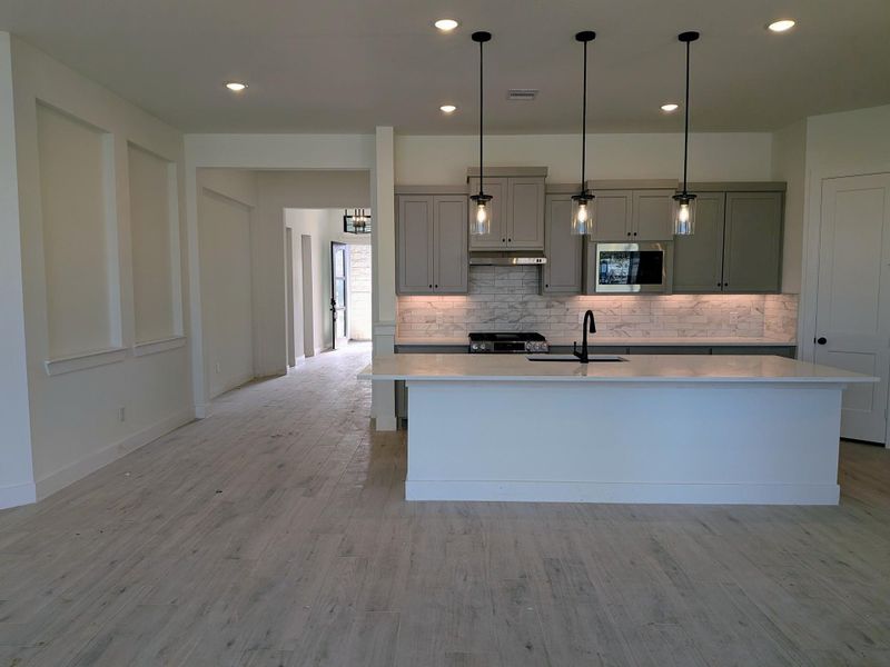 Furnished interior view inside a new home in Artavia, Conroe (Image 9).