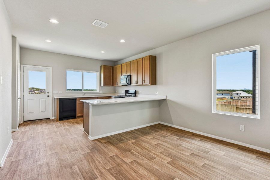 Furnished interior view inside a new home in Cloverleaf, Austin (Image 8).