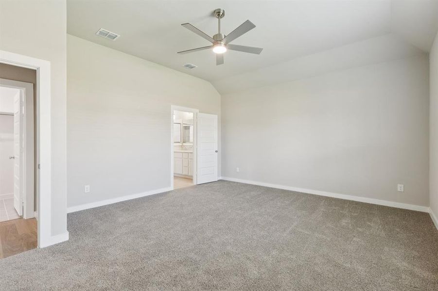 Primary Suite in the Stanley II home plan by Trophy Signature Homes – REPRESENTATIVE PHOTO