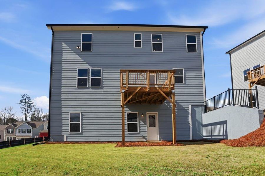 Exterior details and patio area of a home in Falls Creek, Flowery Branch (Image 18).