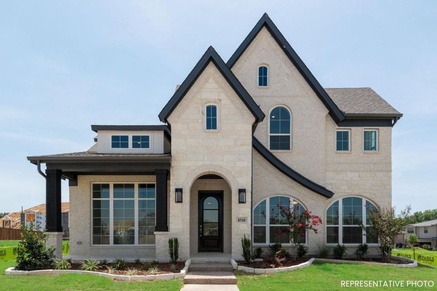 Representative exterior photo of a completed home built from the Royal Palm by Grand Homes in Trails at Cottonwood Creek, Rowlett, TX (Image 1).