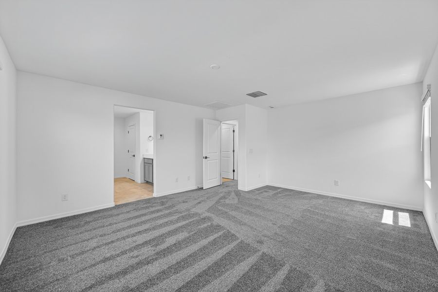 Spacious, unfurnished interior of a new home in Artisan at Asante, Surprise (Image 21).