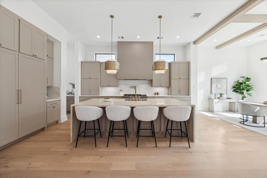 With abundant cabinetry and plenty of counter space, this stunning kitchen is designed for both style and function.