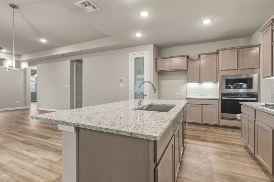Furnished interior view inside a new home in Veranda Designer, San Antonio (Image 10).