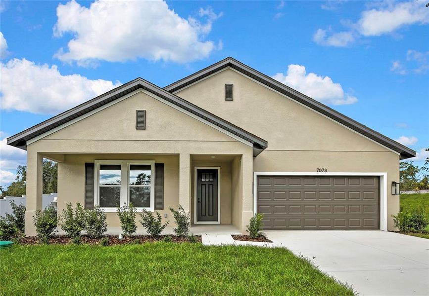 Front exterior of a new home in , Weeki Wachee, FL, highlighting curb appeal (Image 2). Front exterior of a new home in , Weeki Wachee, FL, highlighting curb appeal (Image 2).