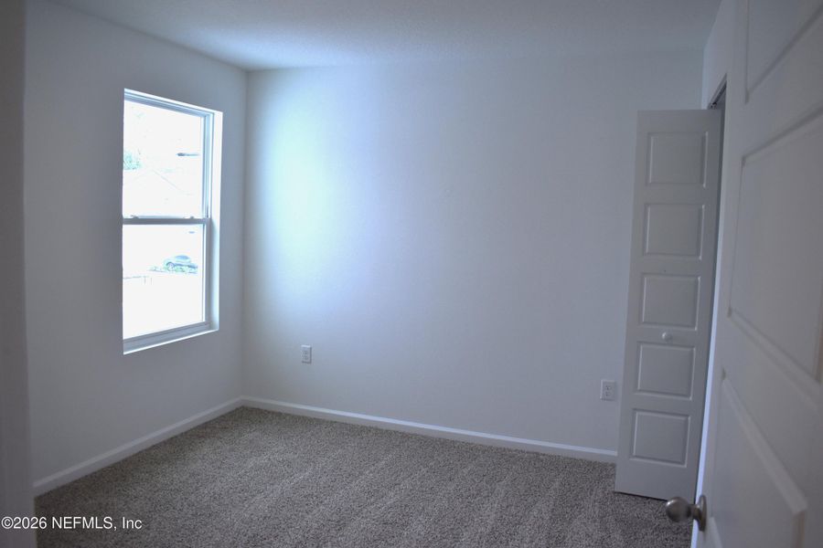 Spacious, unfurnished interior of a new home in Irongate Villas, Jacksonville (Image 24).