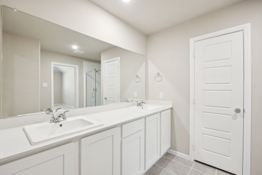 Primary Bathroom in the Harper home plan by Trophy Signature Homes – REPRESENTATIVE PHOTO